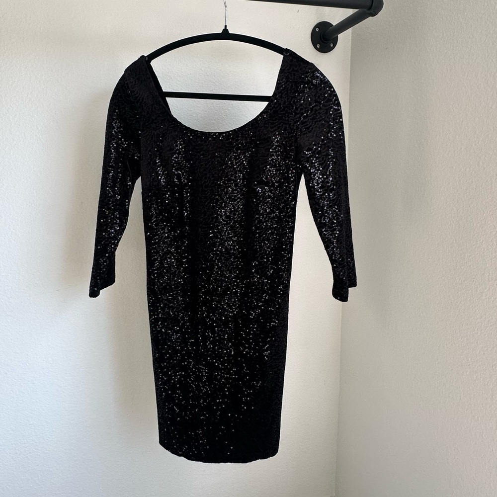Black semi back less sequin dress